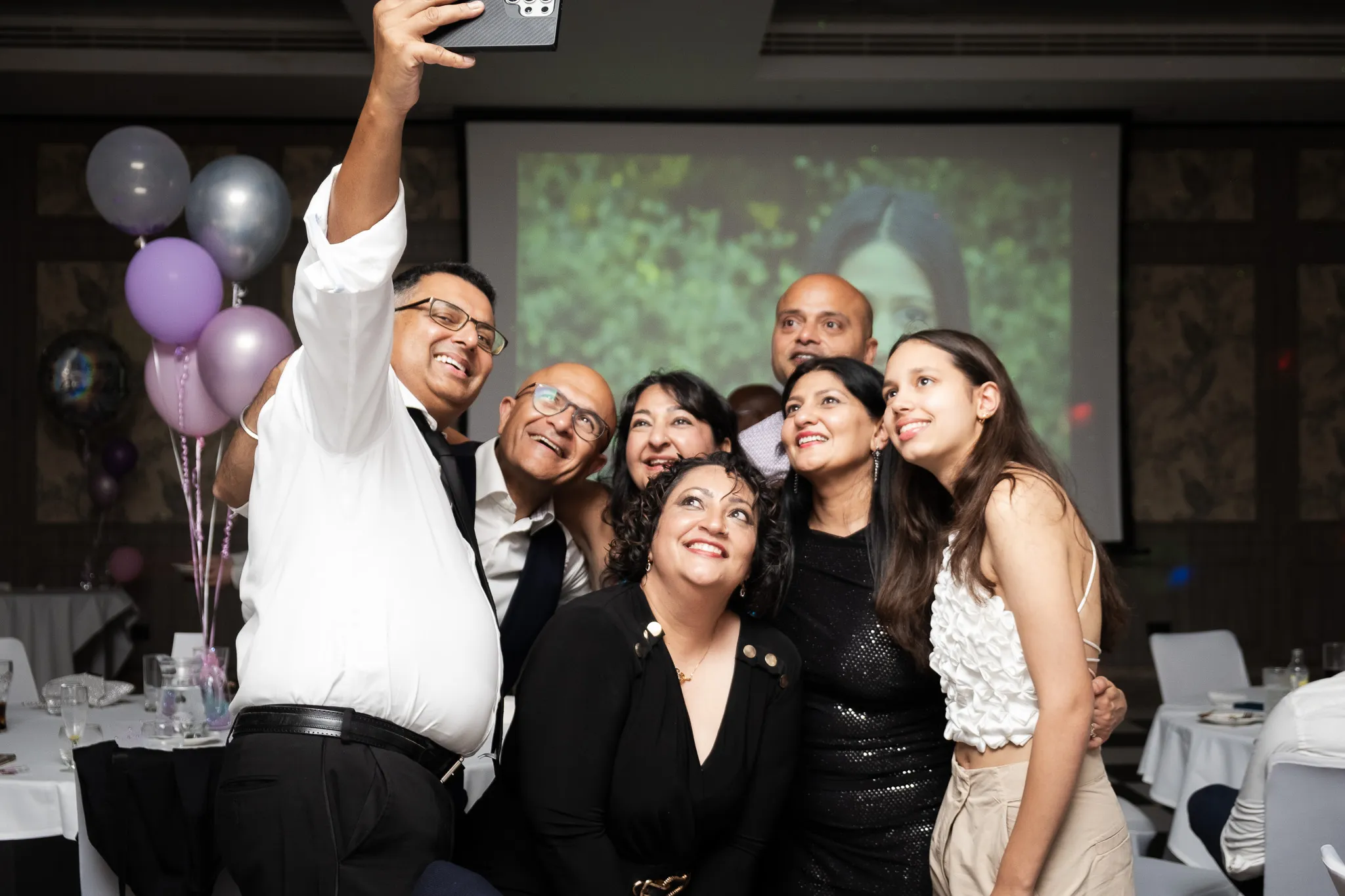 18th birthday celebration for a girl, with family and friends, having fun on the birthday party