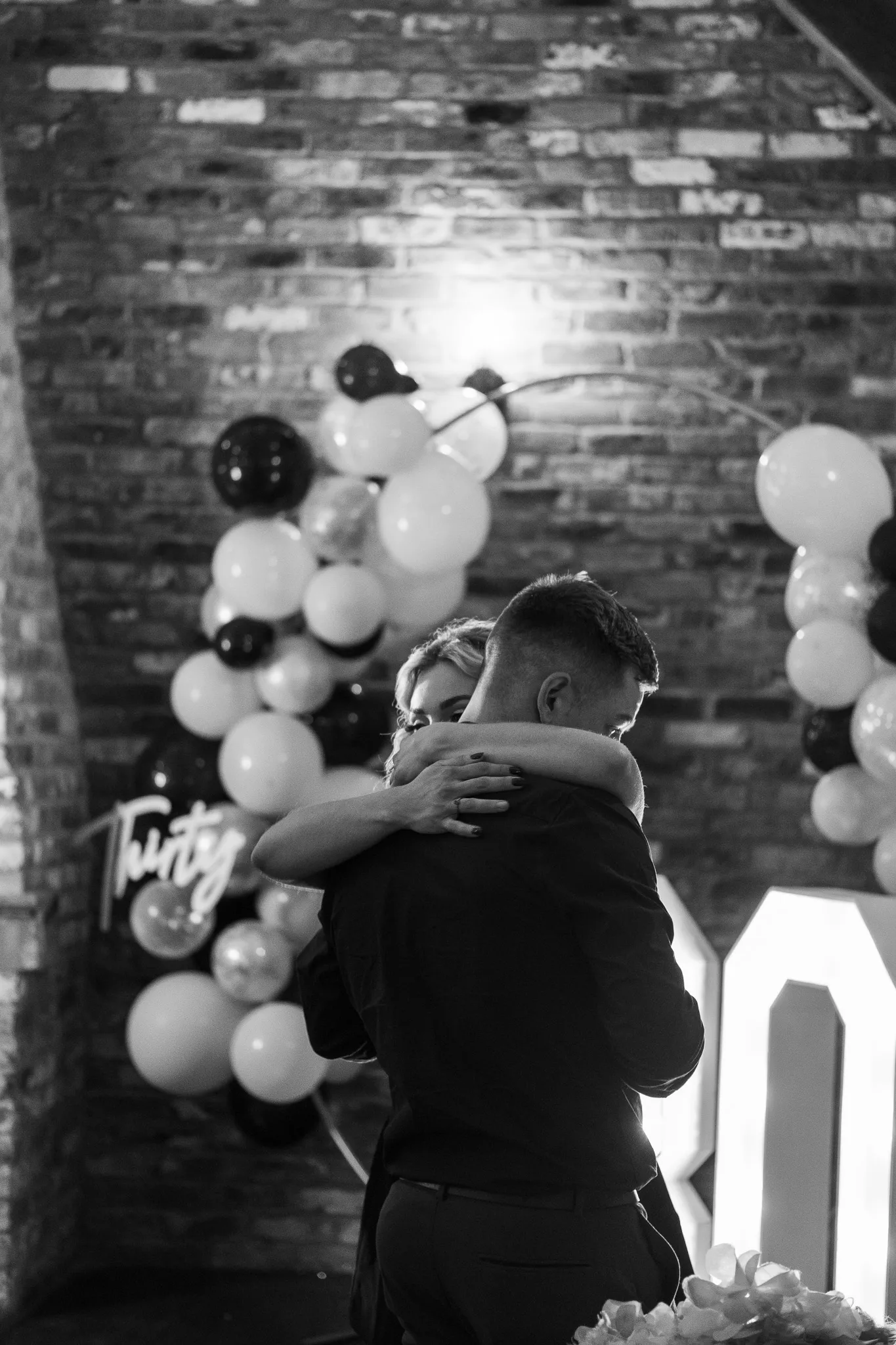 Birthday event, celebrating 30th anniversary, couple celebrating birthday together with family