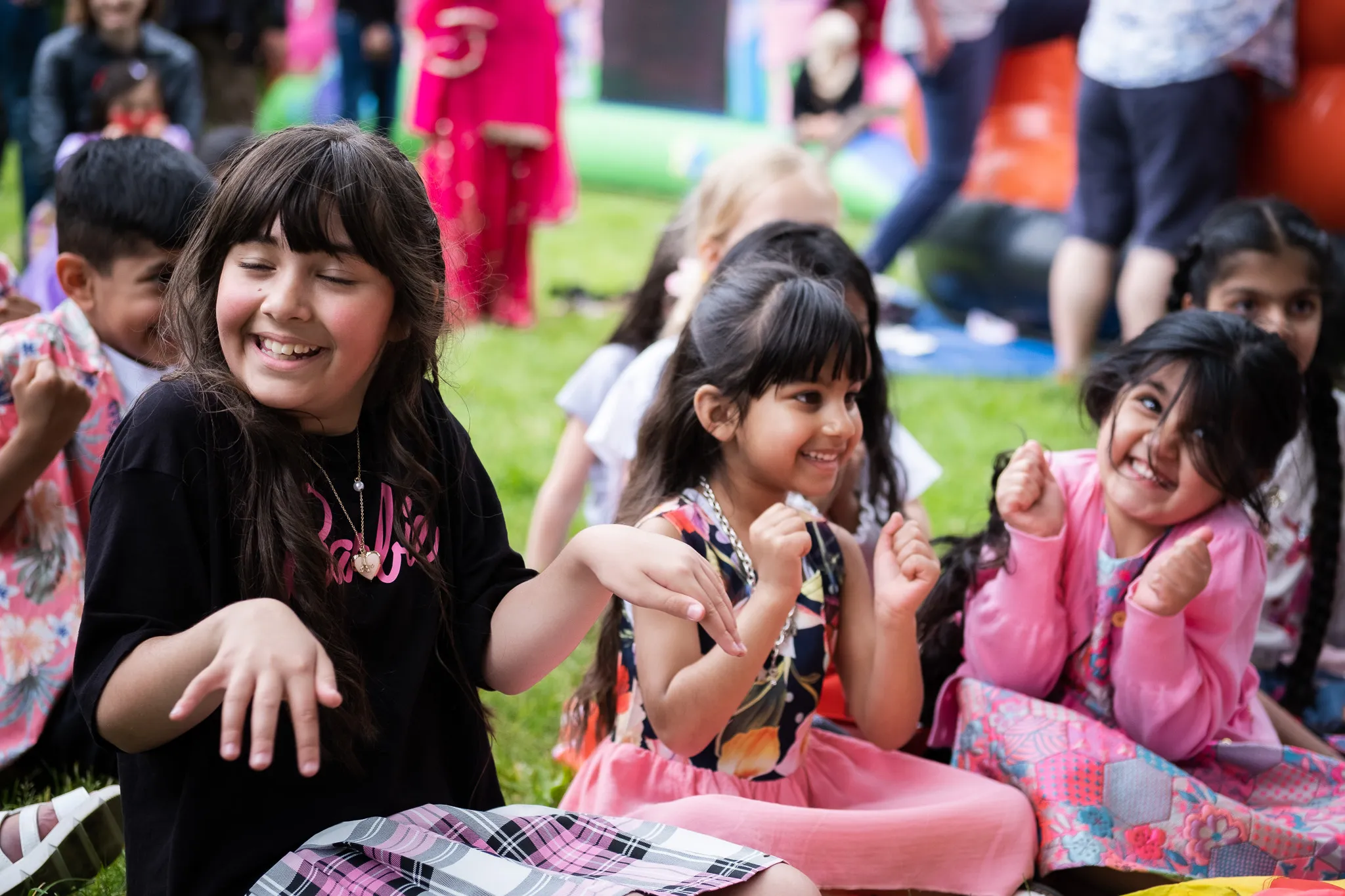 Little girls giggling on birthday event party