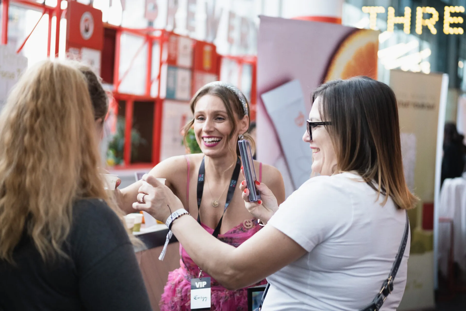Three women making a toast