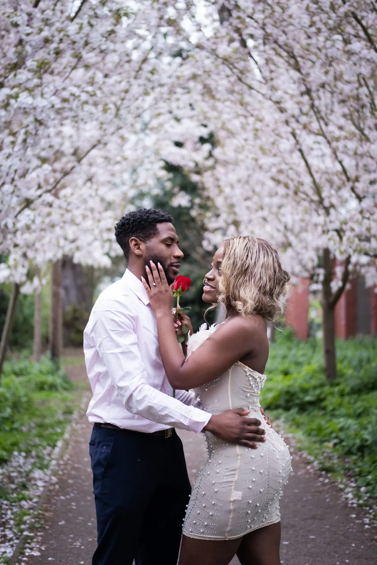 Couple posing for a romantic photo session in Kingston Upon Thames, outdoor romantic photoshoot from MellSnap