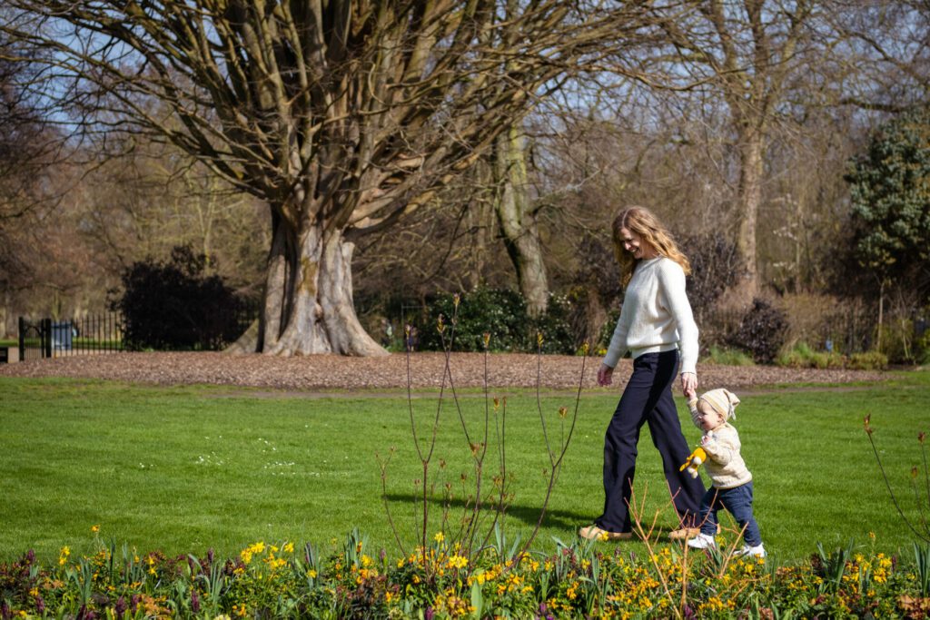 MellSnap outdoor family photography, family photo session, mother walking with her daughter in the park, during spring time